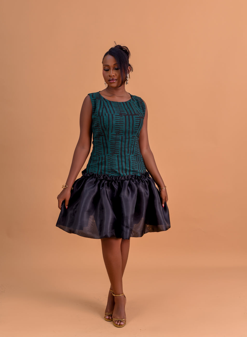 Adire bubble hem mini dress in forest green and black organza by Roseline's Closet
Women's African print mini dress with bubble skirt — green Adire cotton