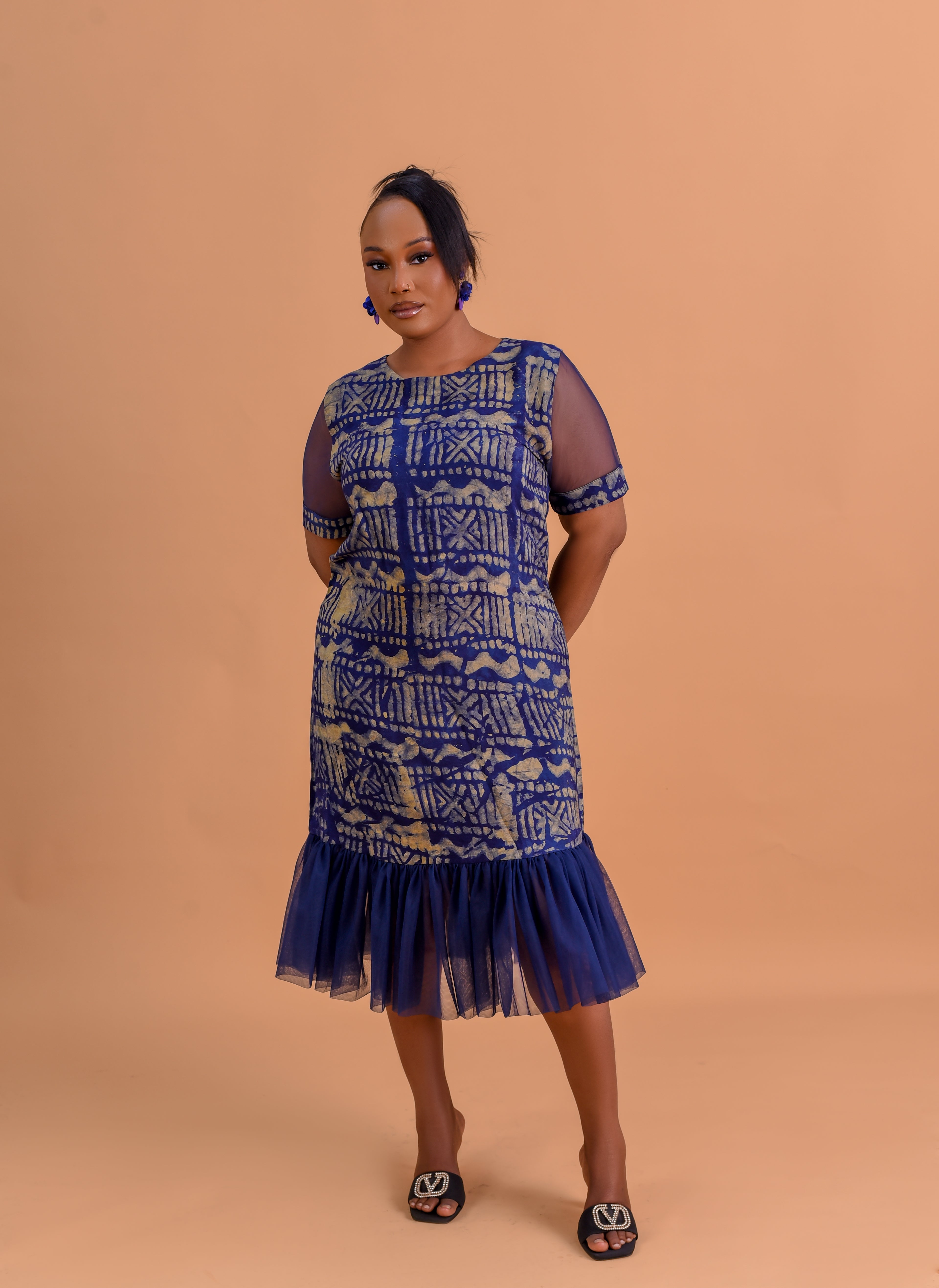 Adire tulle hem midi dress in royal blue and gold Batik print by Roseline's Closet
Women's African Batik midi dress with mesh sleeves and tulle ruffle hem  blue