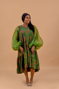 Adire floral balloon sleeve midi dress in olive green and terracotta Batik print by Roseline's Closet
Women's African print midi dress with oversized organza balloon sleeves  green floral Batik
