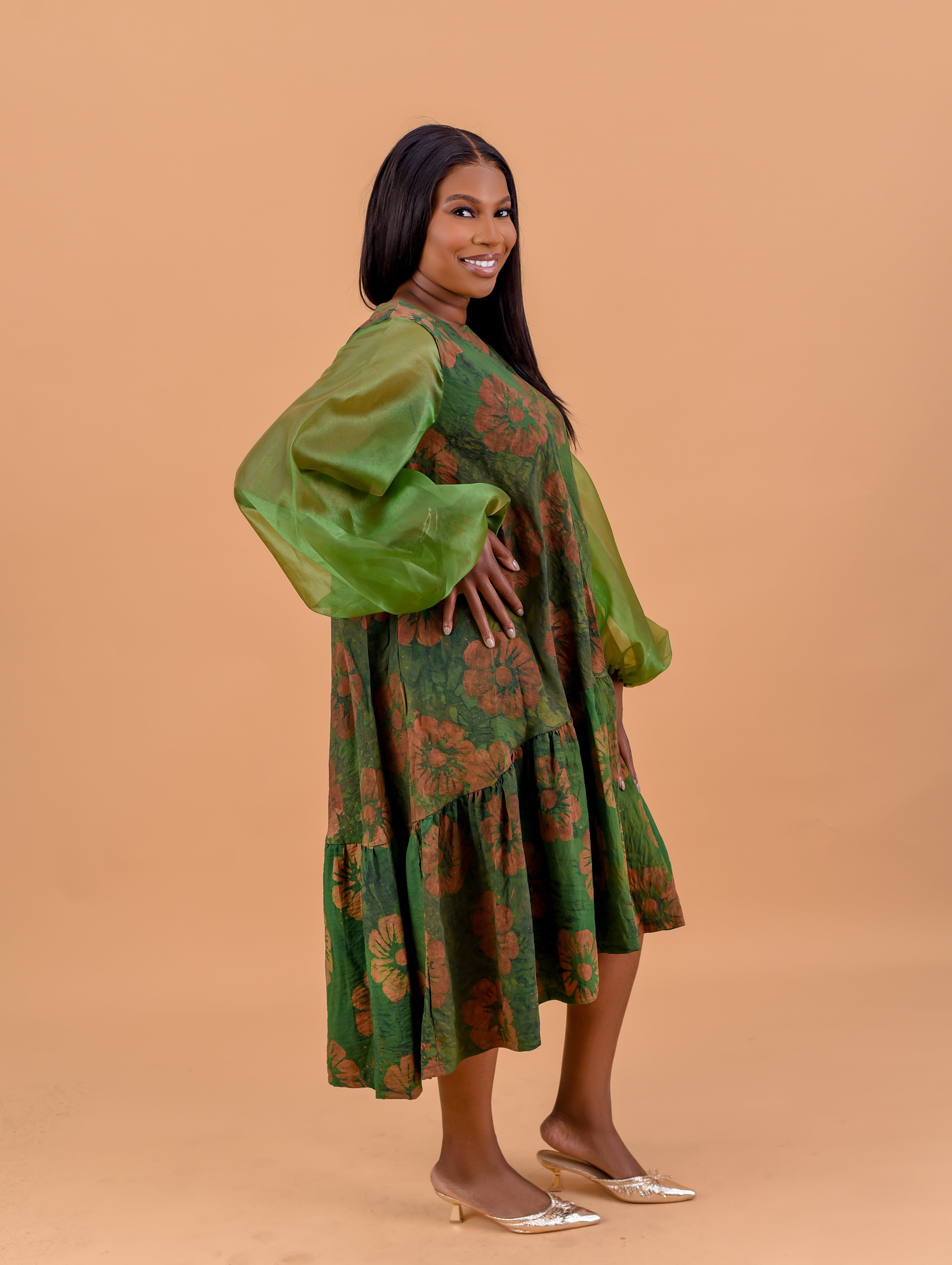 Adire floral balloon sleeve midi dress in olive green and terracotta Batik print by Roseline's Closet
Women's African print midi dress with oversized organza balloon sleeves  green floral Batik