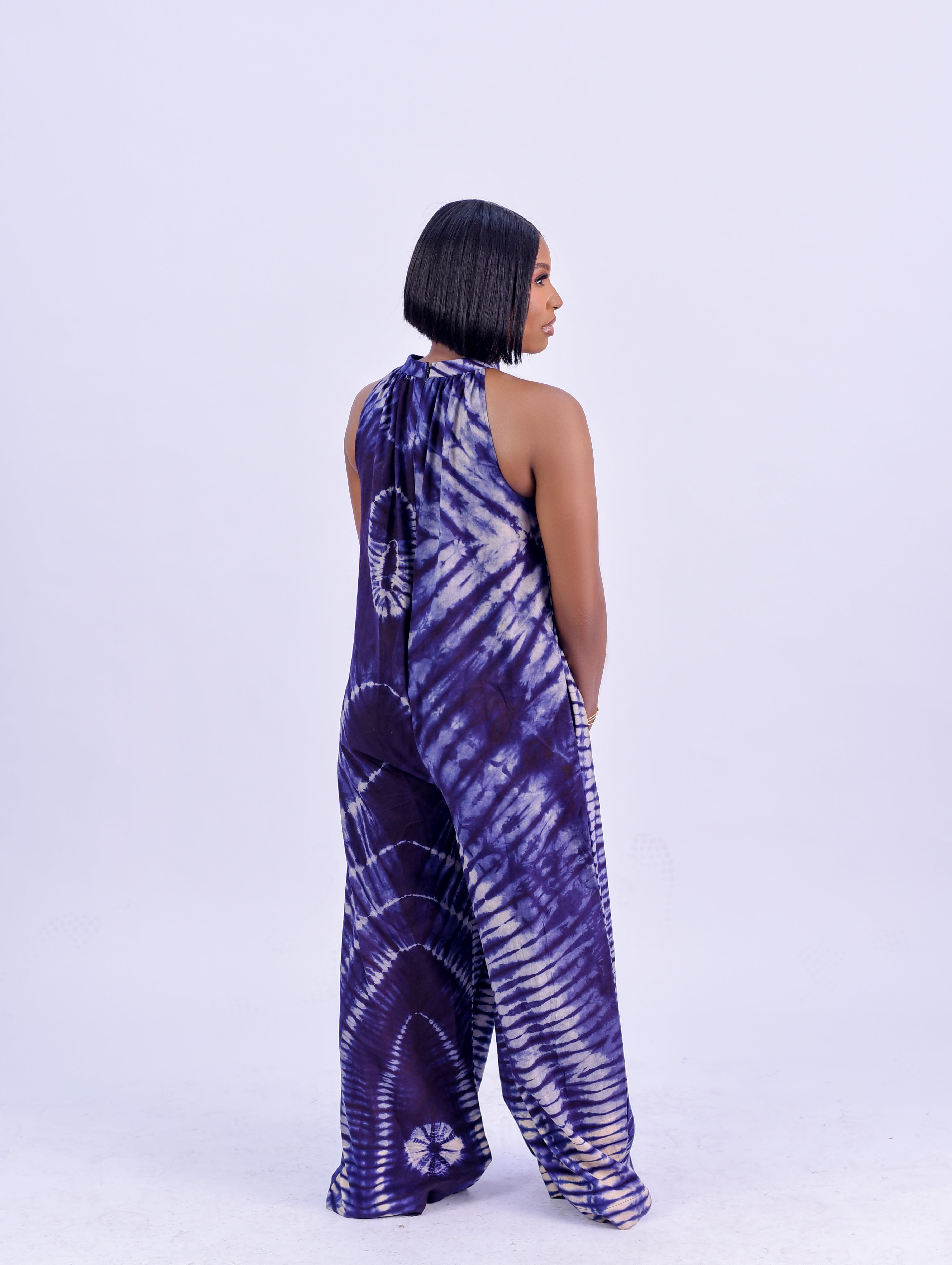 Adire halter neck wide leg jumpsuit in blue and nude tie-dye cotton by Roseline's Closet
Women's African print halter jumpsuit with wide palazzo legs blue  Adire cotton