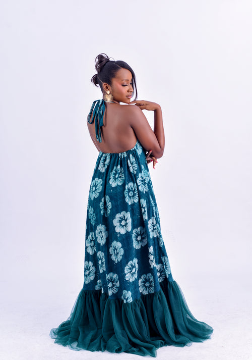 Adire halter neck tulle maxi dress in teal and white floral Adire print by Roseline's Closet
Women's African print halter maxi dress with tulle ruffle hem teal Batik floral