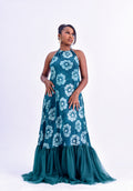 Adire halter neck tulle maxi dress in teal and white floral Adire print by Roseline's Closet
Women's African print halter maxi dress with tulle ruffle hem teal Batik floral