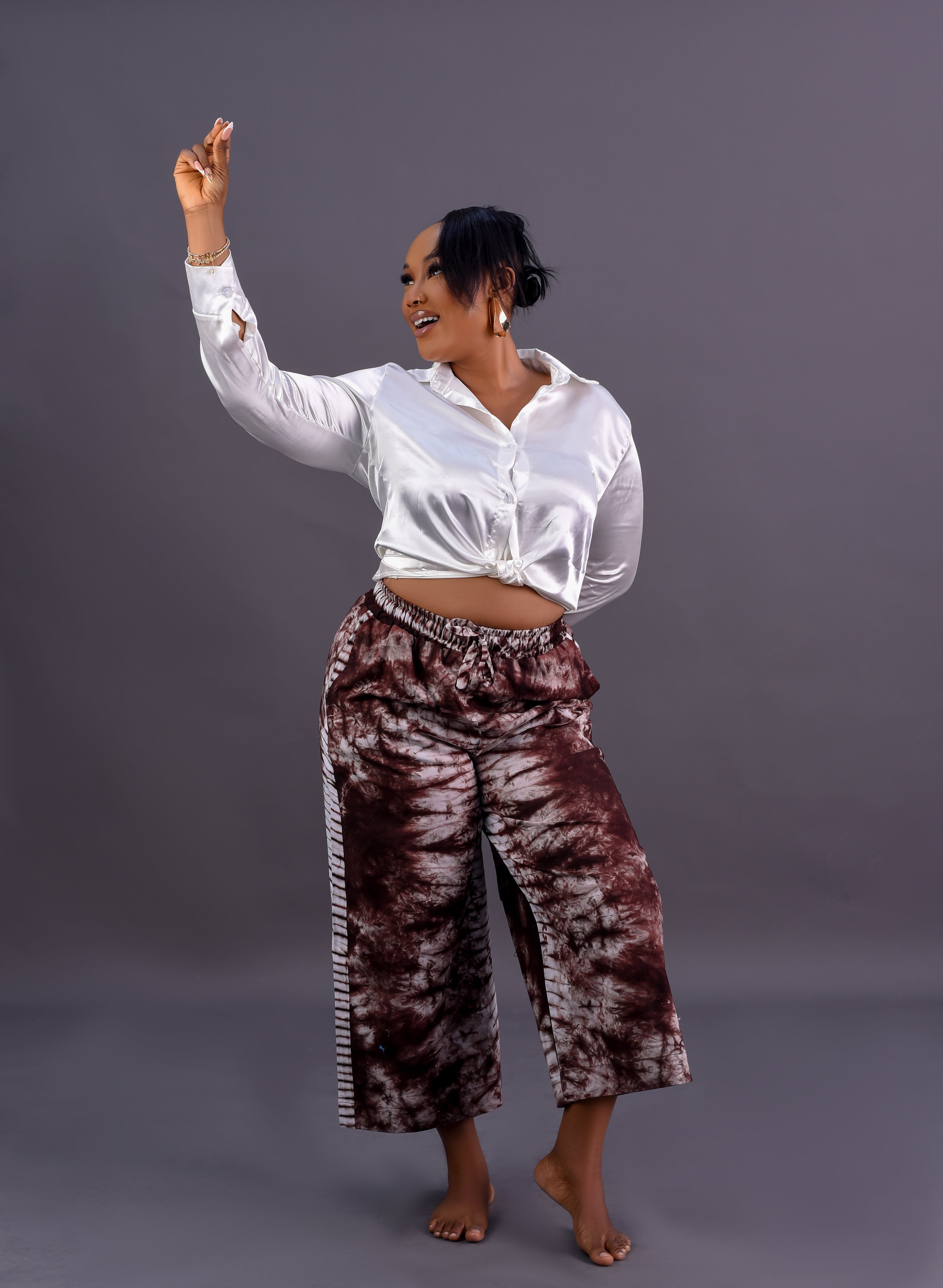 Adire wide leg culotte pants in teal and nude tie-dye cotton by Roseline's Closet
Women's African print wide leg cropped trousers brown Adire tie-dye cotton